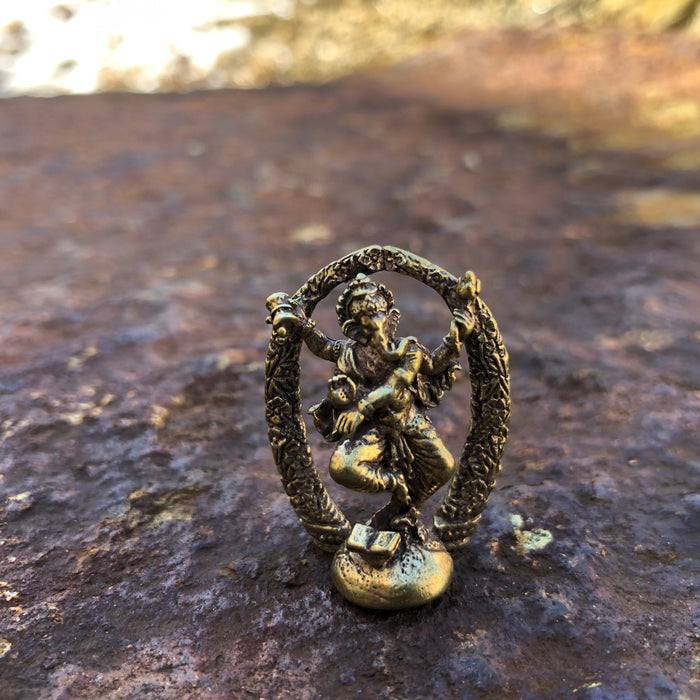 Ganesh reclining - brass, 1 ”- 2 ” tall